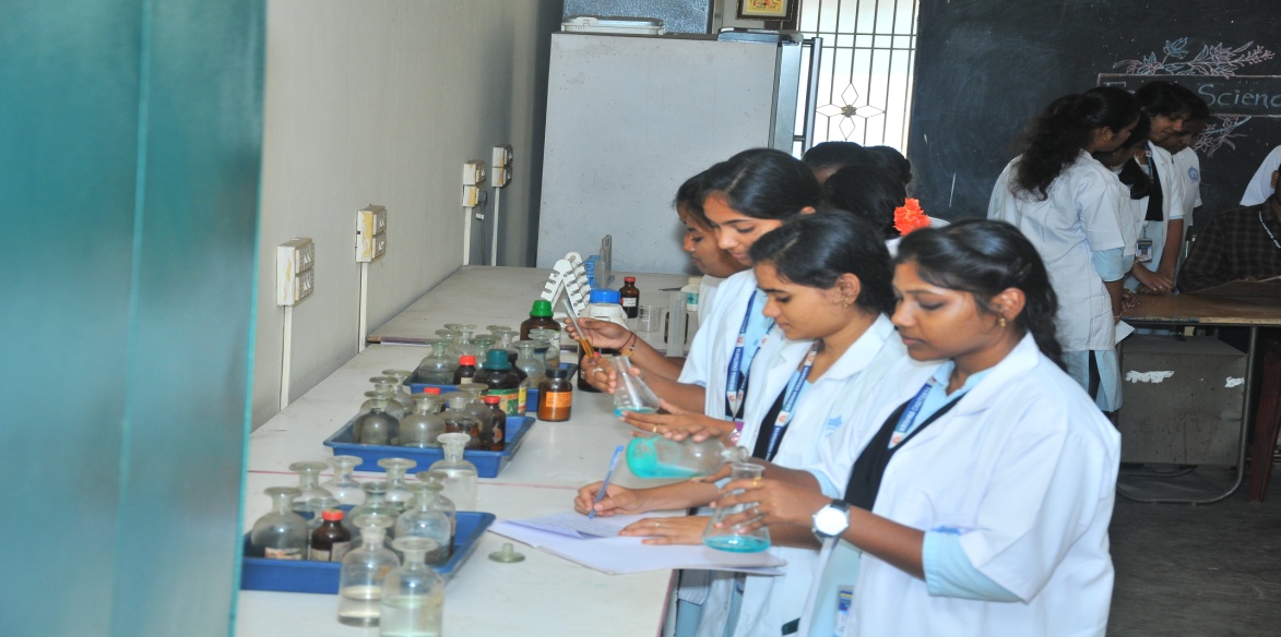 Students performing experiments in biotechnology lab